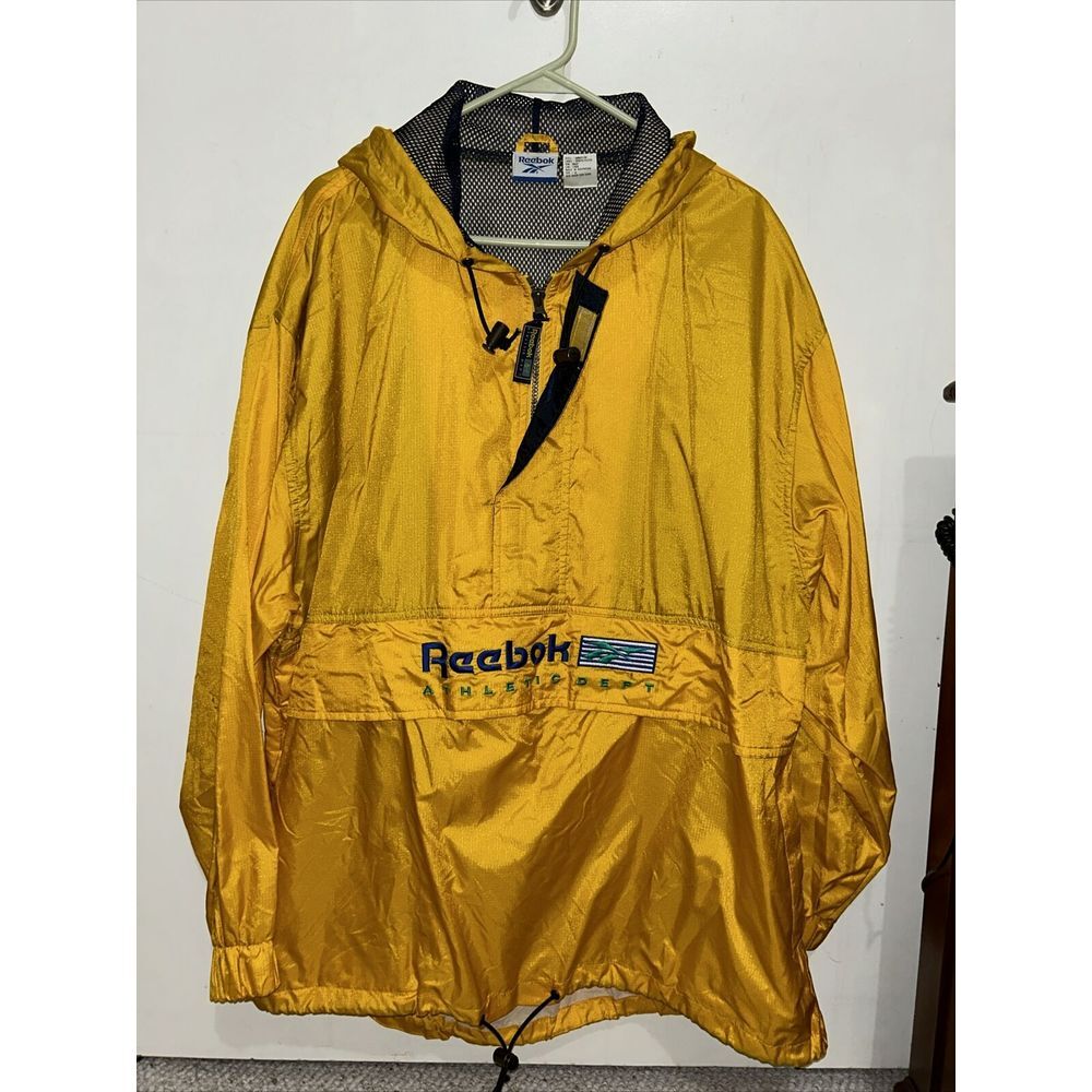 VTG Reebok windbreaker With Pouch Pocket 1990's mens XL (One Spot On Sleeve)‎